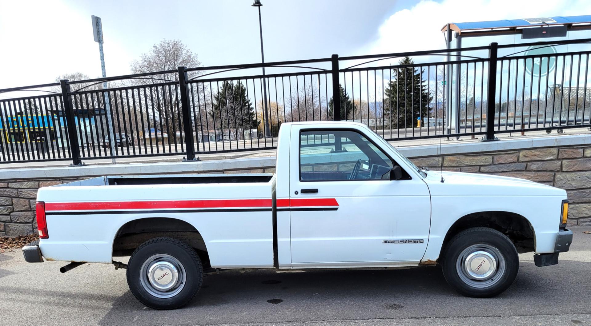 1991 White /Red GMC Sonoma Special (1GTCS14E9M8) with an 2.5L I4 engine, 5 Speed manual transmission, located at 450 N Russell, Missoula, MT, 59801, (406) 543-6600, 46.874496, -114.017433 - 2.5L I4 Engine. 5 Speed Manual Transmission. Runs and Drives well. Financing NOT Available on this Vehicle. - Photo#1